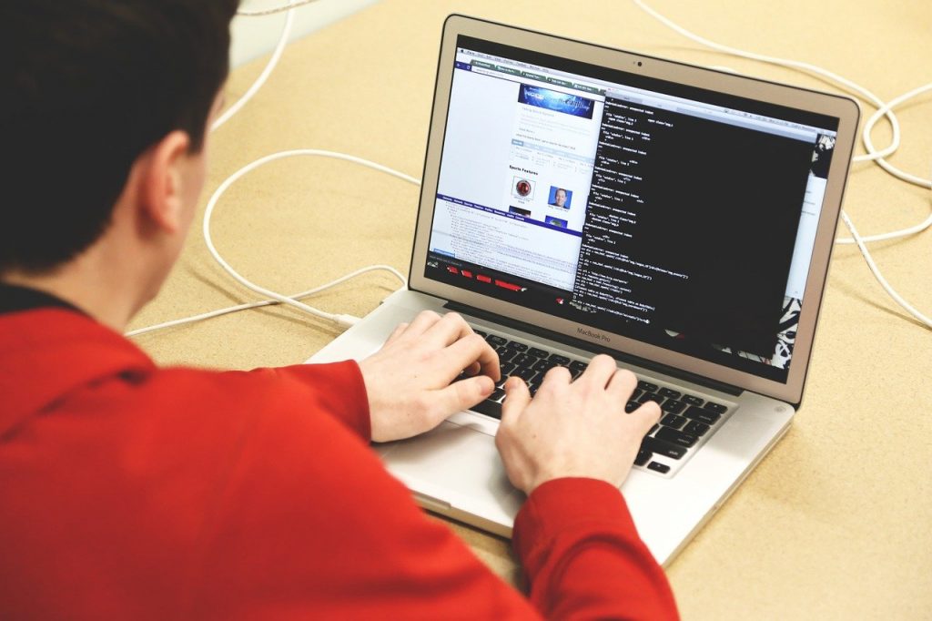 A web developer coding a website